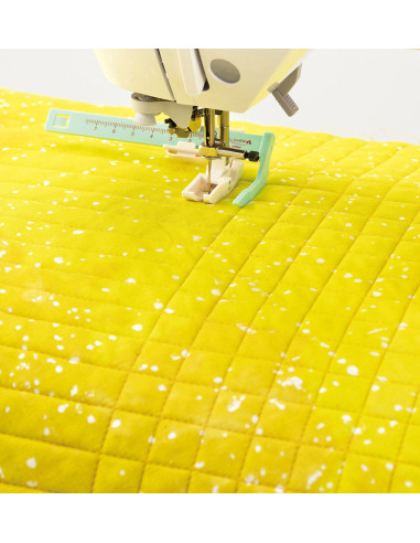 Quilting guide foot for sewing machine