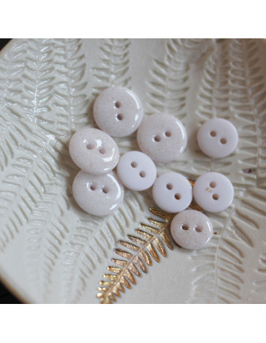 Off-white glitter button with 2 holes