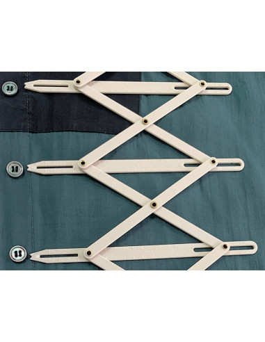 Measuring rule for plastic buttonholes