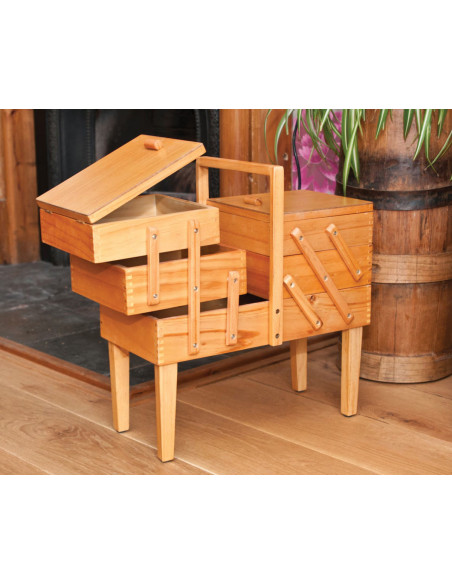Woodworker sewing on Caramel legs