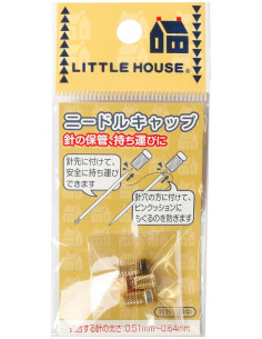 Metal protective caps for hand needles