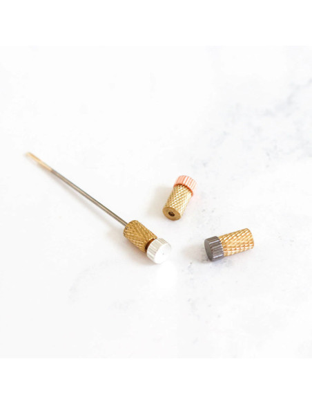Metal protective caps for hand needles