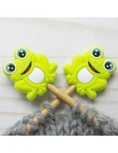 Frog stitch stoppers for knitting needles