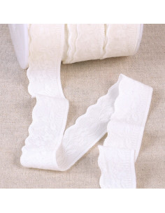 Elastic lingerie with a white lace floral and leaf pattern