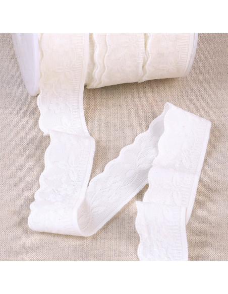Elastic lingerie with a white lace floral and leaf pattern