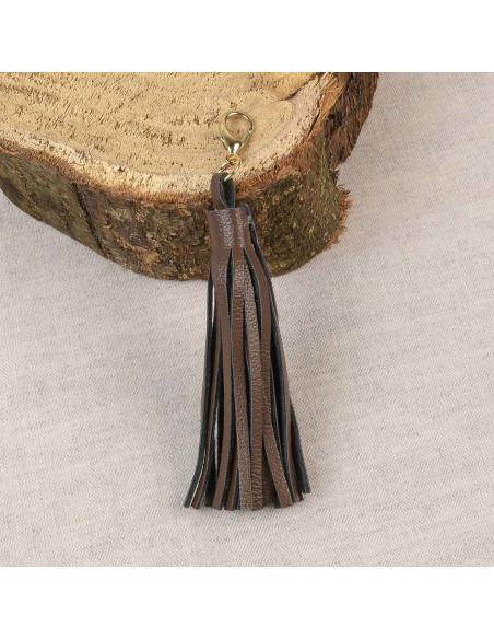 Dark brown pompom with clasp
