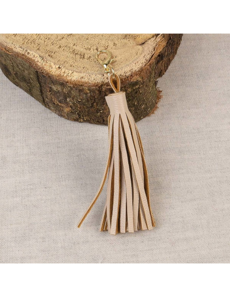 Beige pompom with clasp