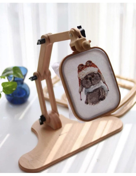 Adjustable stand for embroidery hoop