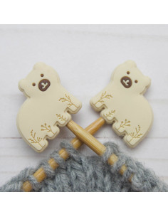 Polar bear stitch stoppers for knitting needles