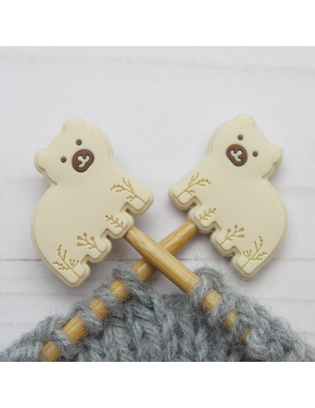 Polar bear stitch stoppers for knitting needles