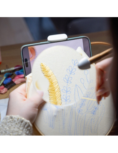 Lamp on table with magnifying glass, tray, and phone clamp Daylight Anita