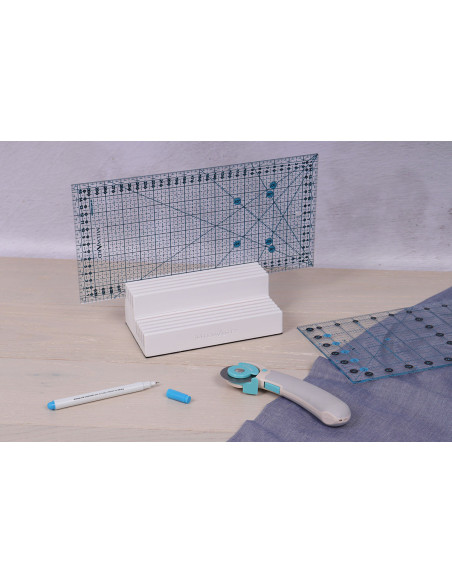 White wooden rack with 10 slots for patchwork rulers