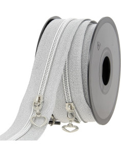 5-meter roll of 5 mm nylon zipper with heart pulls - Silver lurex