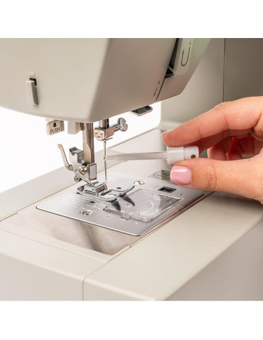 Needle changing tool for Singer sewing machines