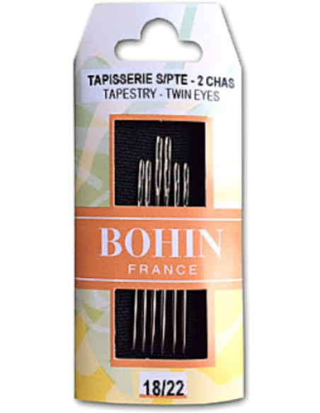 Cross-stitch needles, canvas, and knitting without a point with a double eye