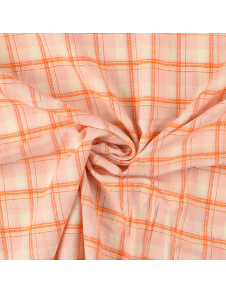 Light pink tartan flannel fabric with orange stripes