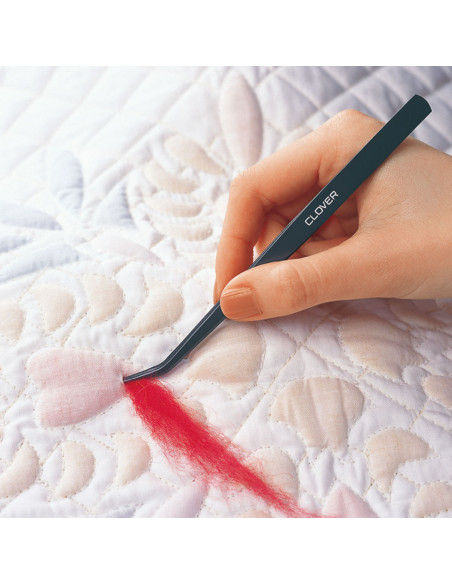 Clover stuffing tool